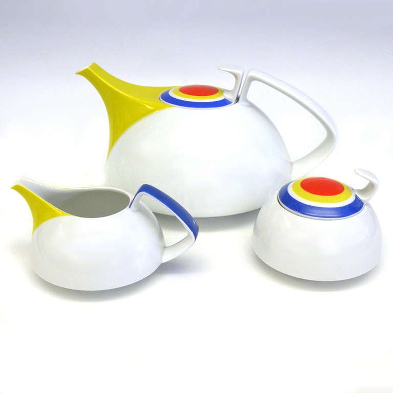 Circa 1970s, this stunning modernist tea and dessert set was designed by Walter Gropius and  Louis McMillan. Amusingly enough, Gropius is responsible for the form and Herbert Bayer, the architect, created the Bauhaus homage color scheme. Made in