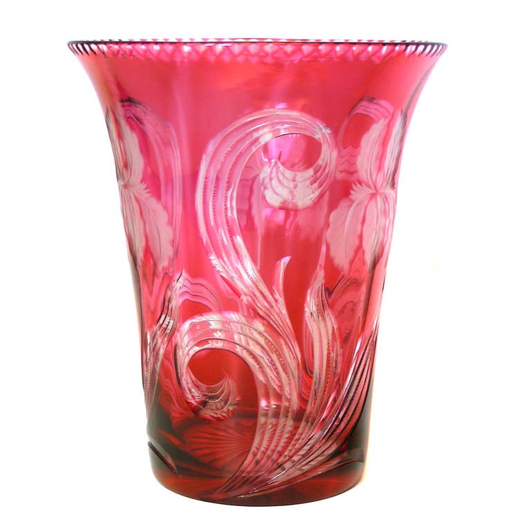 Circa 1930s, Stevens & Williams, marked as Royal Brierley, England. This exquisite Stevens & Williams vase in a cranberry cut-to-clear Art Deco motif features detailed flowers, long curling stems and leaves. At over 9 inches high, it is a useful