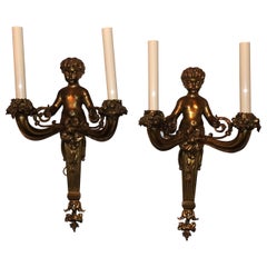 Wonderful Pair of French Doré Bronze Cherub Putti Figural Two-Arm Sconces