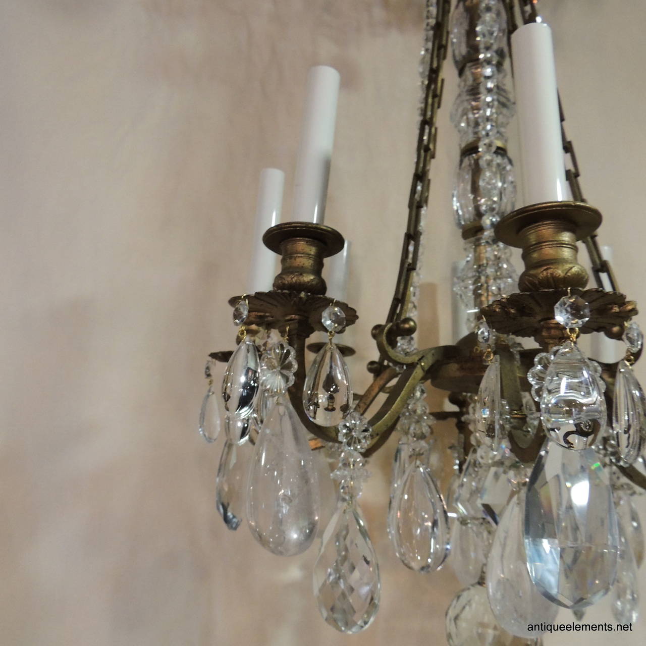 Early 20th Century Bagues Style Eight-Light Gilt Bronze and Rock Crystal French Chandelier For Sale