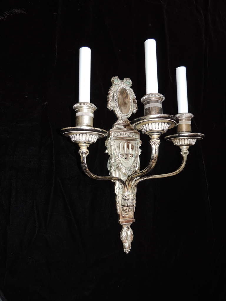 Rare To Have A Set Of 4 Caldwell silvered bronze three-arm sconces, with new wiring and sockets.
Measure: 16