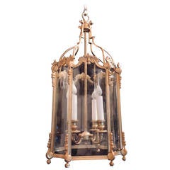 Antique Outstanding French Doré Bronze Four-Light Neoclassical Curved Glass Lantern