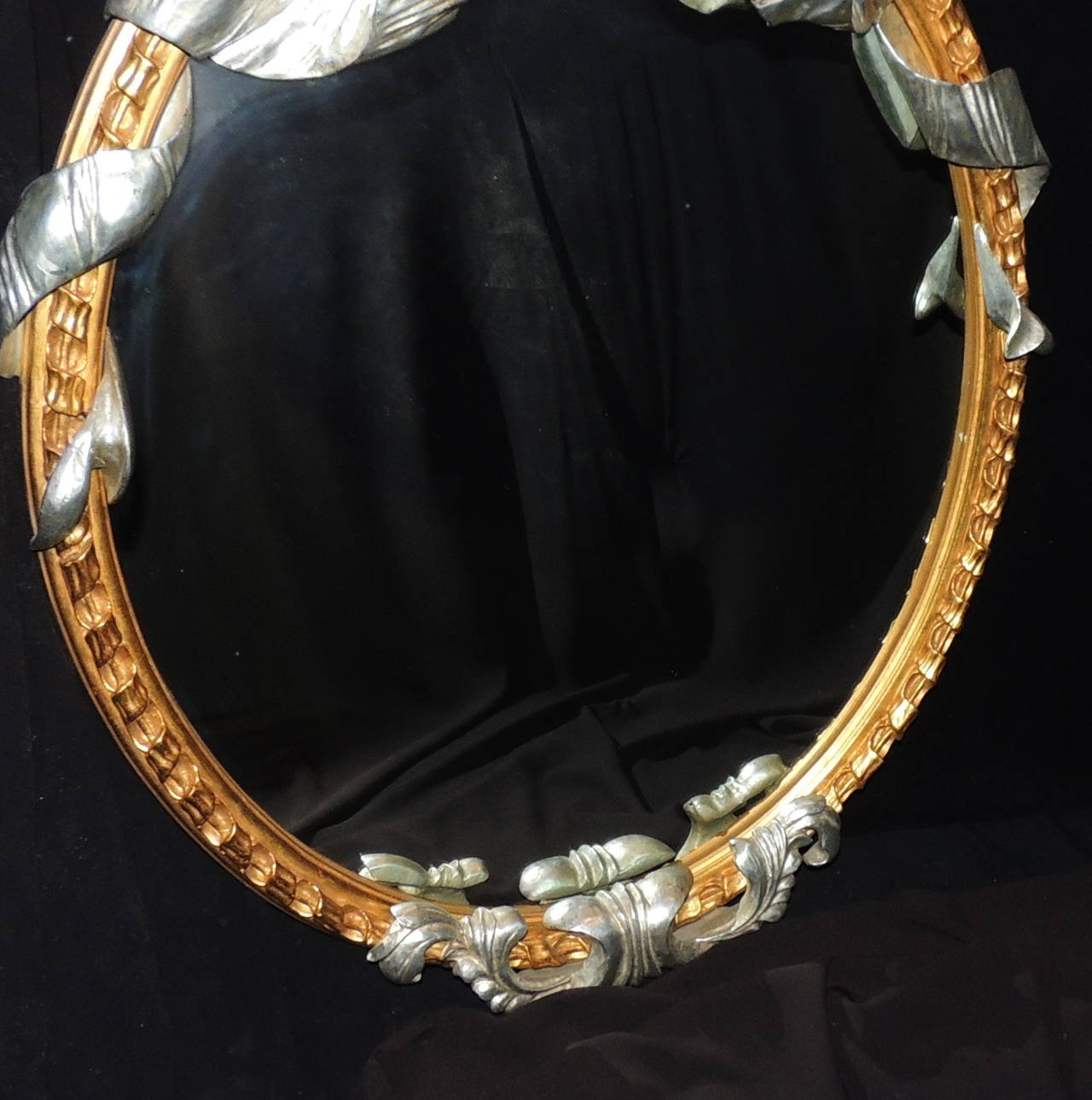 Mid-20th Century Wonderful French Oval Giltwood Mirror with Silver Leaf Bow and Ribbon Detail