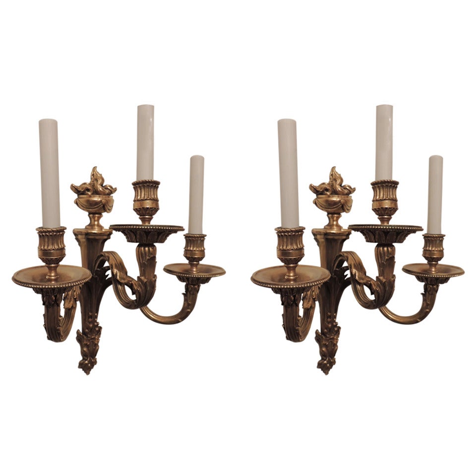 Pair of Gilt Bronze Neoclassical Three-Arm Urn Top Sconces E.F. Caldwell For Sale