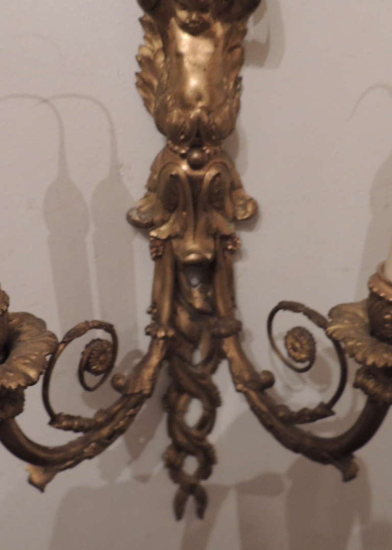 Exquisite Pair Of Large Dore Bronze Cherub Putti Wall Sconces By E.F. Caldwell In Good Condition In Roslyn, NY
