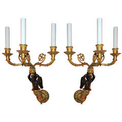 Pair of French Doré Bronze and Patina Three-Arm Cherub or Putti Sconces