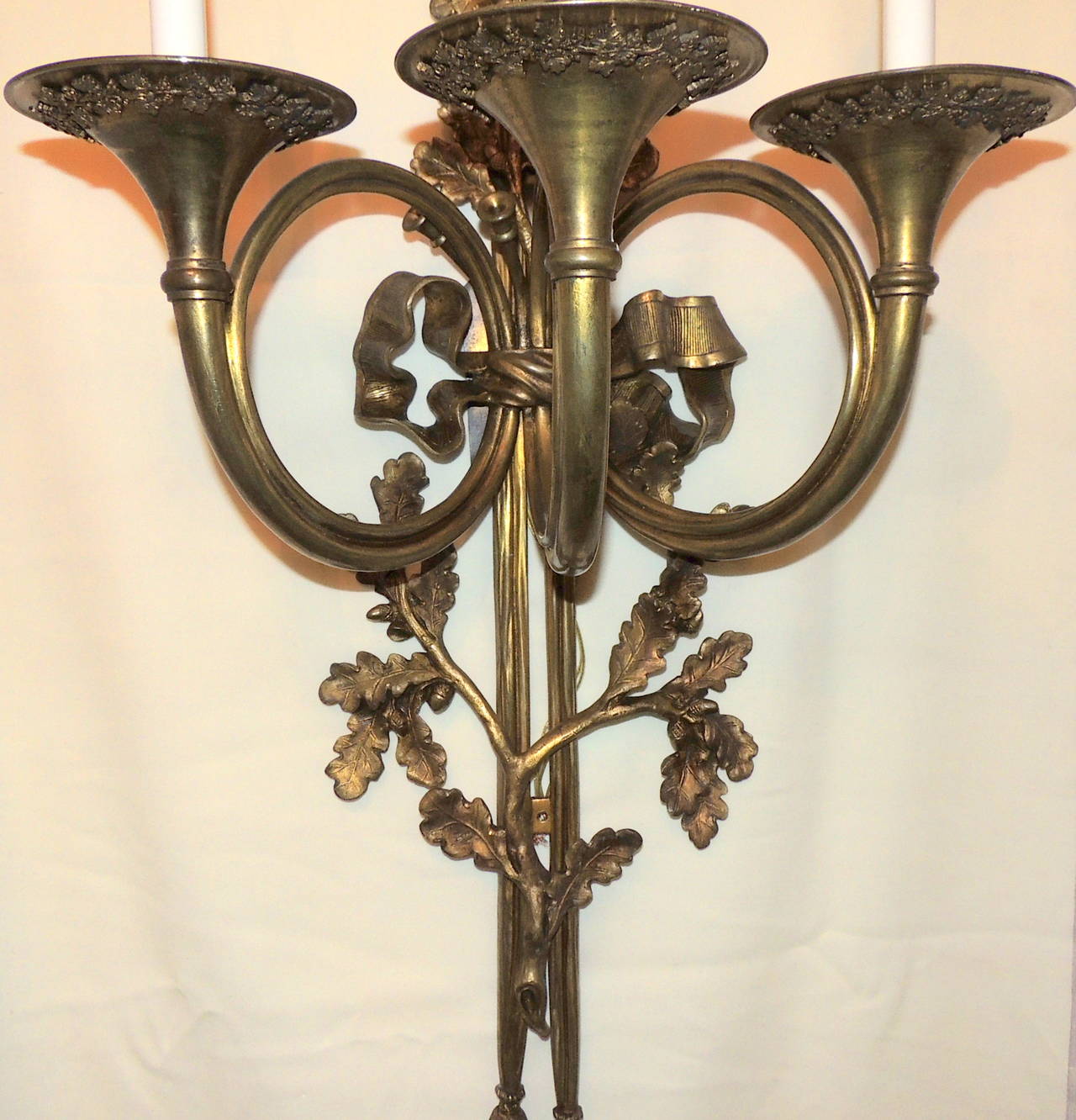 Wonderful Monumental Large Pair Bronze French Horn Flute Bow Top Tassel Sconces In Good Condition For Sale In Roslyn, NY