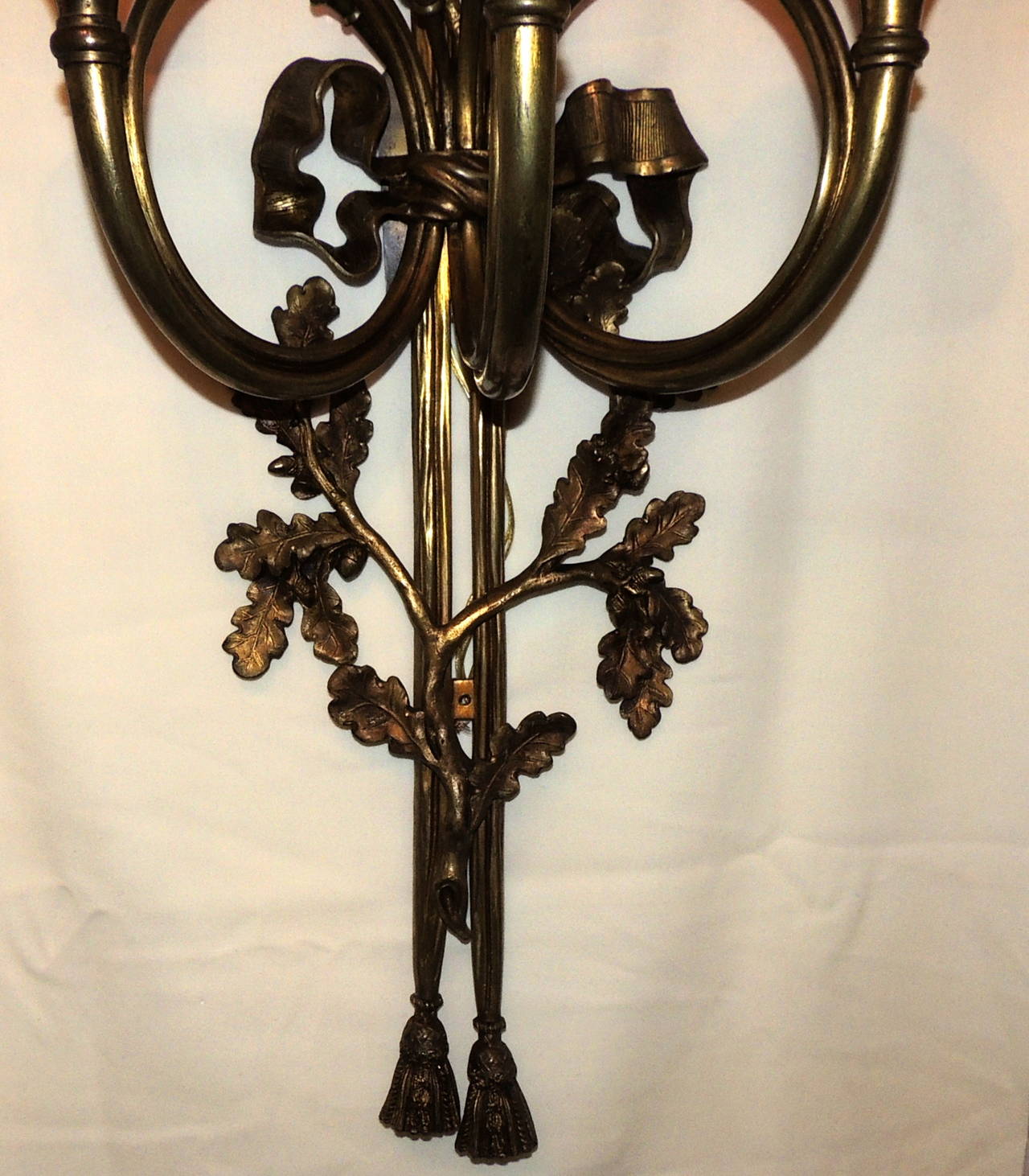 Early 20th Century Wonderful Monumental Large Pair Bronze French Horn Flute Bow Top Tassel Sconces For Sale