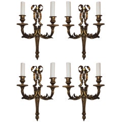 An Outstanding Set Of Four Gilt Bronze 2 Arm Bow Top French Wall Sconces
