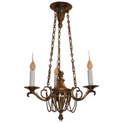Neoclassical Three-Arm French Bronze Swag and Scroll-Arm Chandelier
