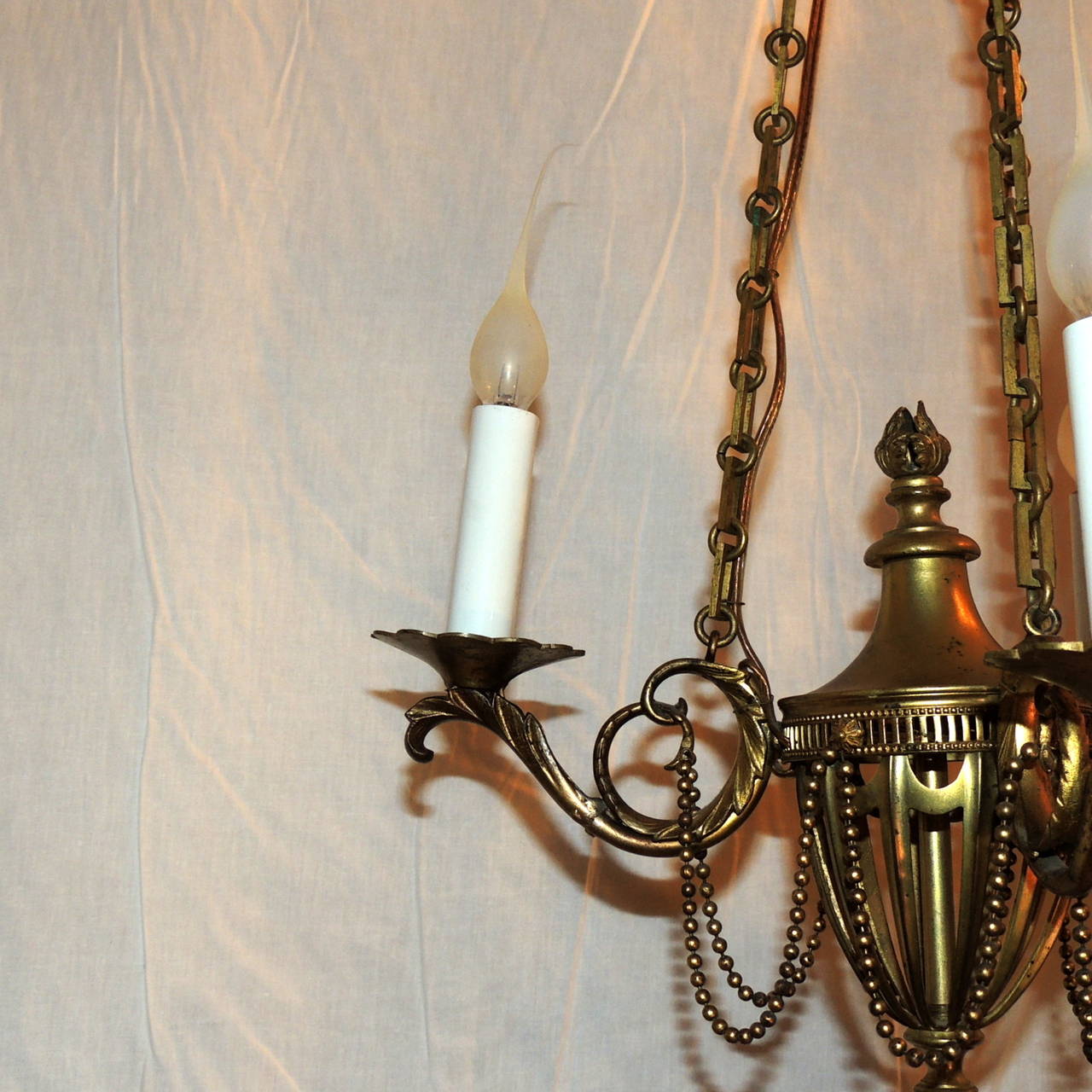 Neoclassical Three-Arm French Bronze Swag and Scroll-Arm Chandelier In Good Condition For Sale In Roslyn, NY