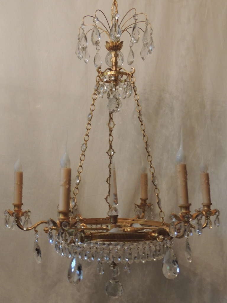 French doré bronze and crystal six-arm chandelier with cut crystal bowl. There are three interior lights.

Recently dored.