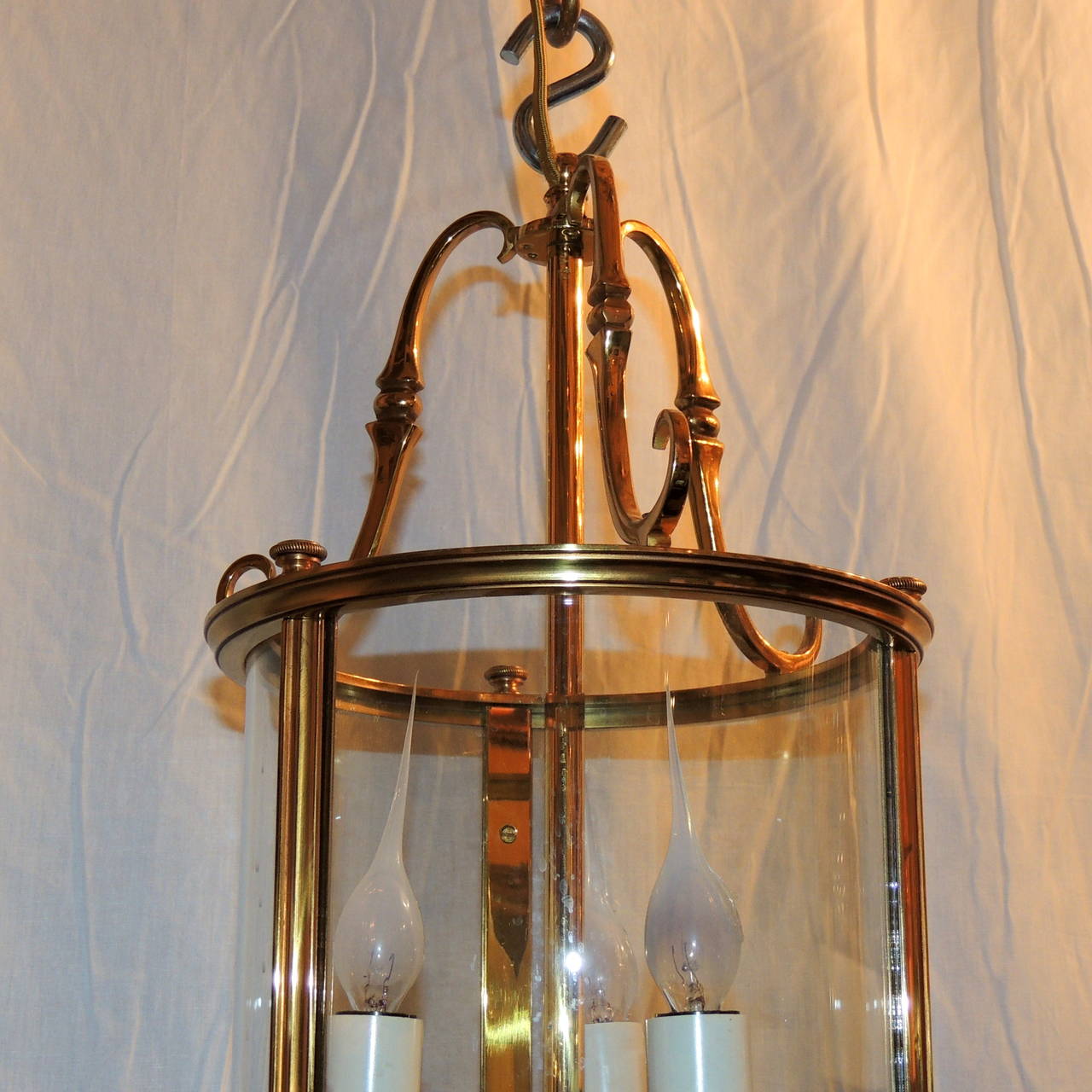 Wonderful Pair Gilt Bronze Louis XVI Lantern Fixtures with Curved Glass Panels In Good Condition In Roslyn, NY