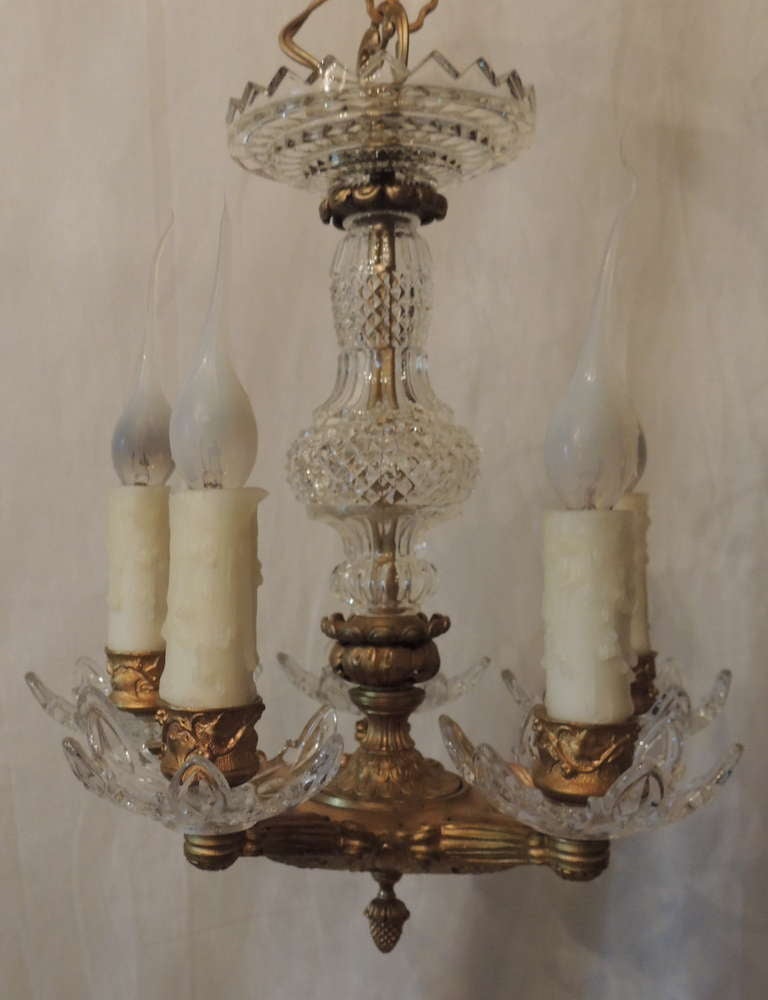 Charming French doré bronze and cut crystal five-light chandelier.