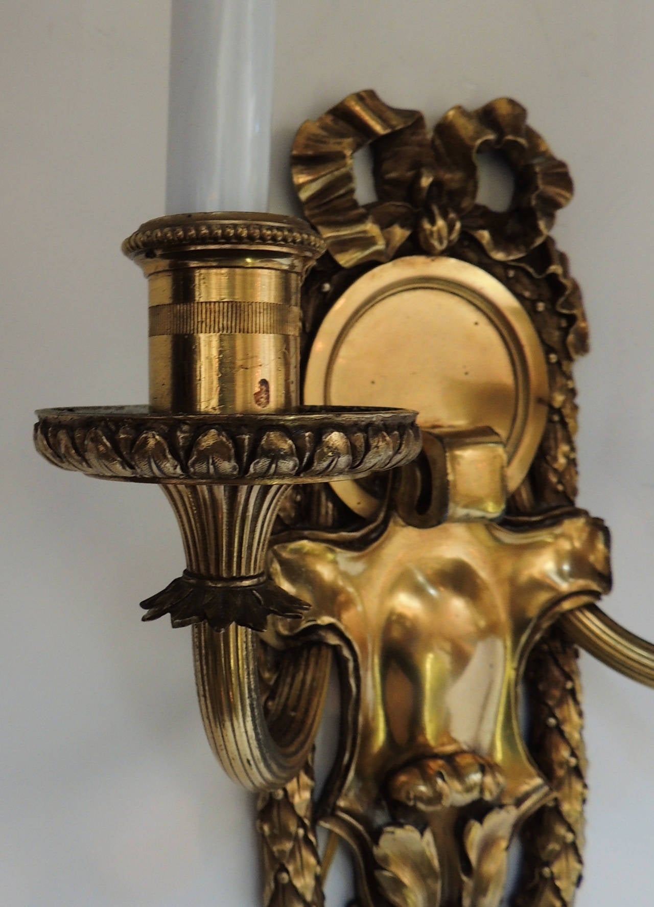 Early 20th Century Elegant Set Six E.F. Caldwell Gilt Bronze Two-Arm Neoclassical Bow-Top Sconces