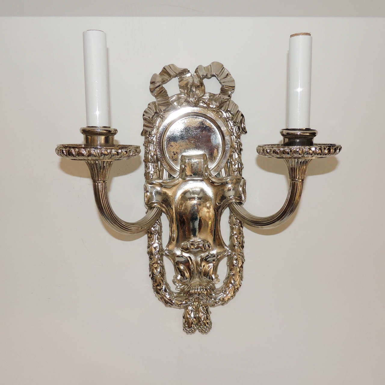 Early 20th Century Incredible Pair Polished Nickel Silver Caldwell Bow Top Neoclassical Sconces