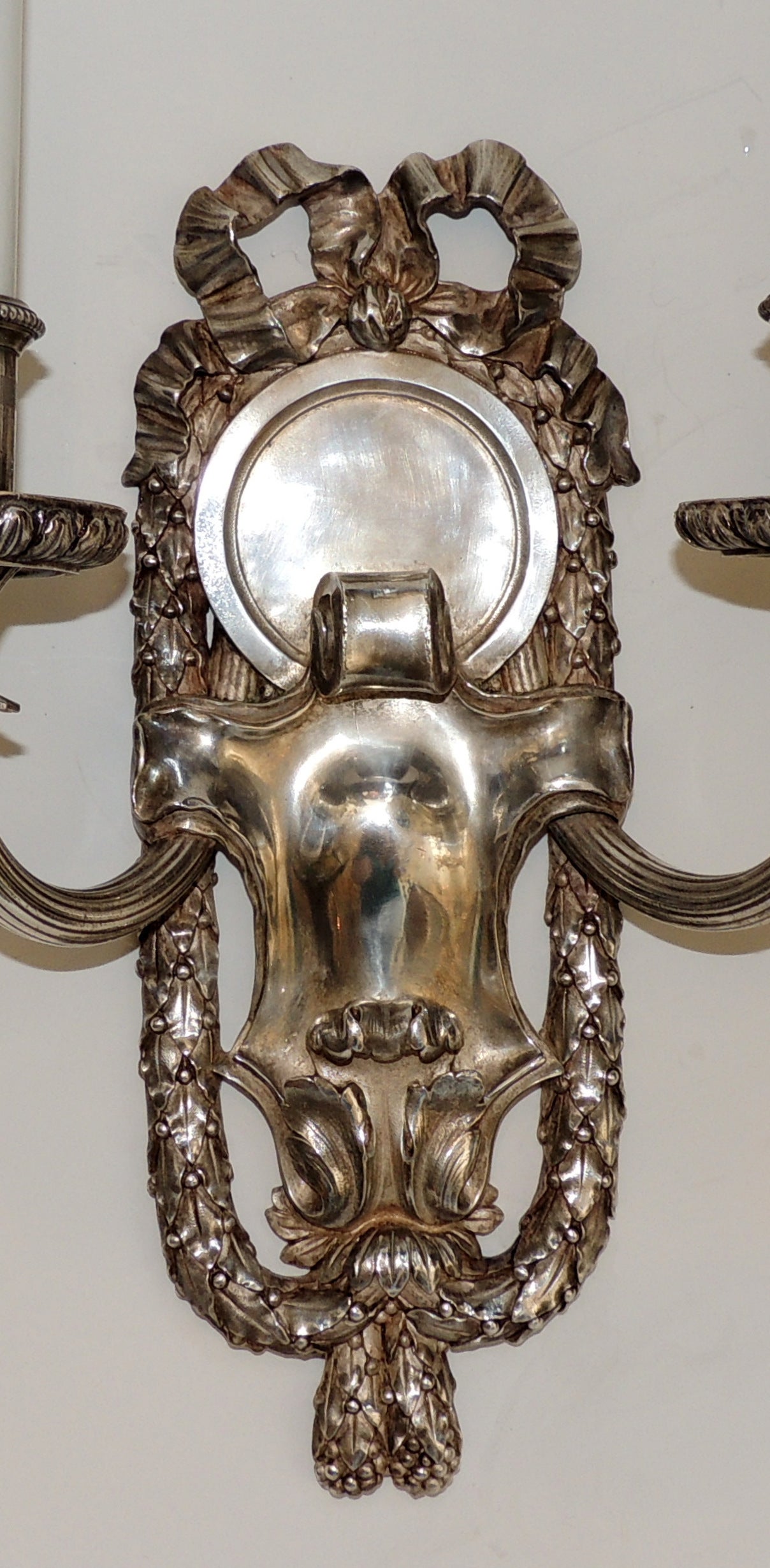 American Elegant Pair of E.F. Caldwell Silvered Bronze Two-Arm Neoclassical Bow Sconces