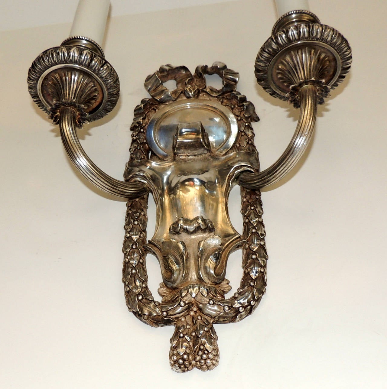 Elegant Pair of E.F. Caldwell Silvered Bronze Two-Arm Neoclassical Bow Sconces In Good Condition In Roslyn, NY
