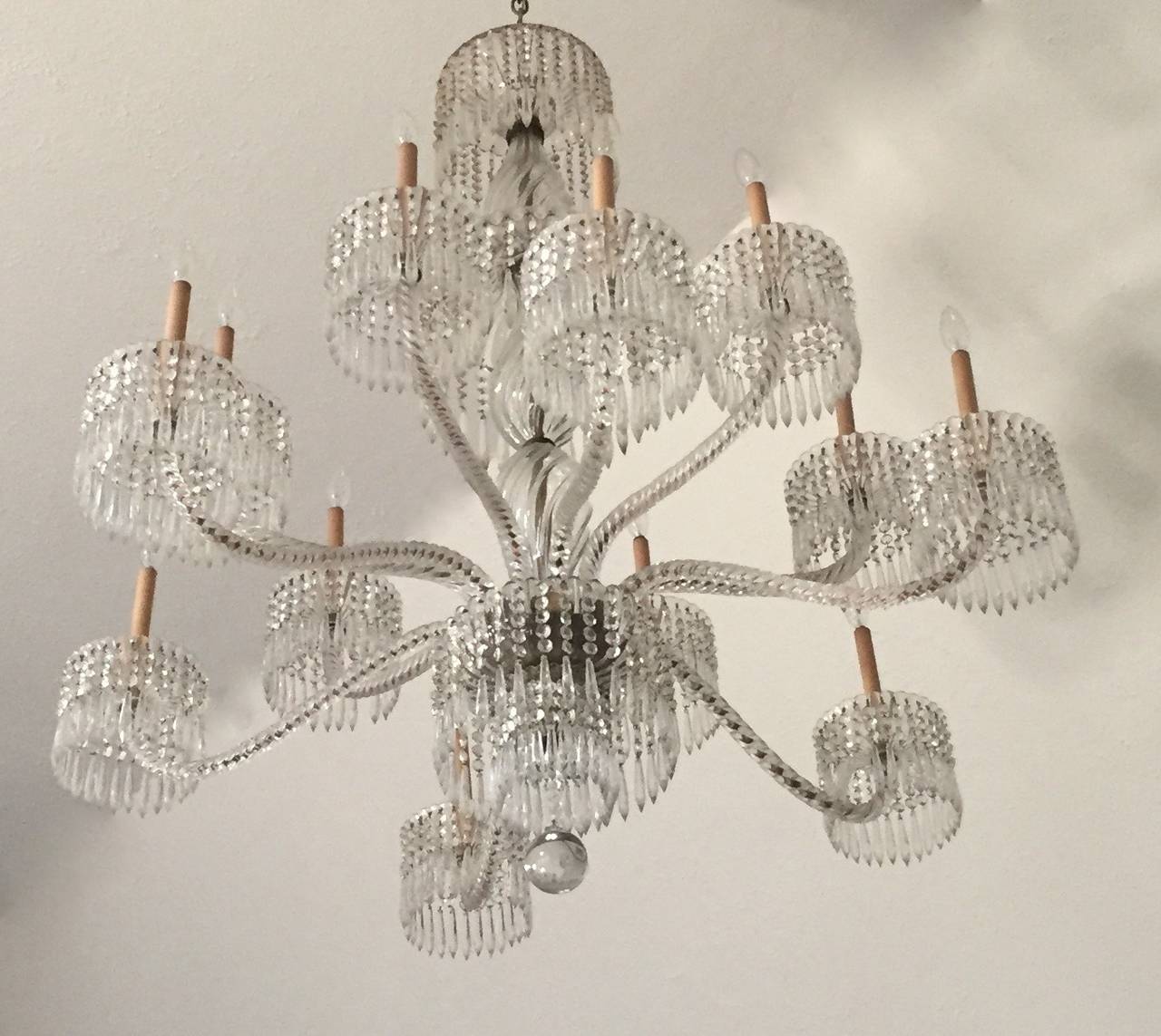 This exceptional 19th century Baccarat twist rope arm crystal chandelier with twelve lights is 48