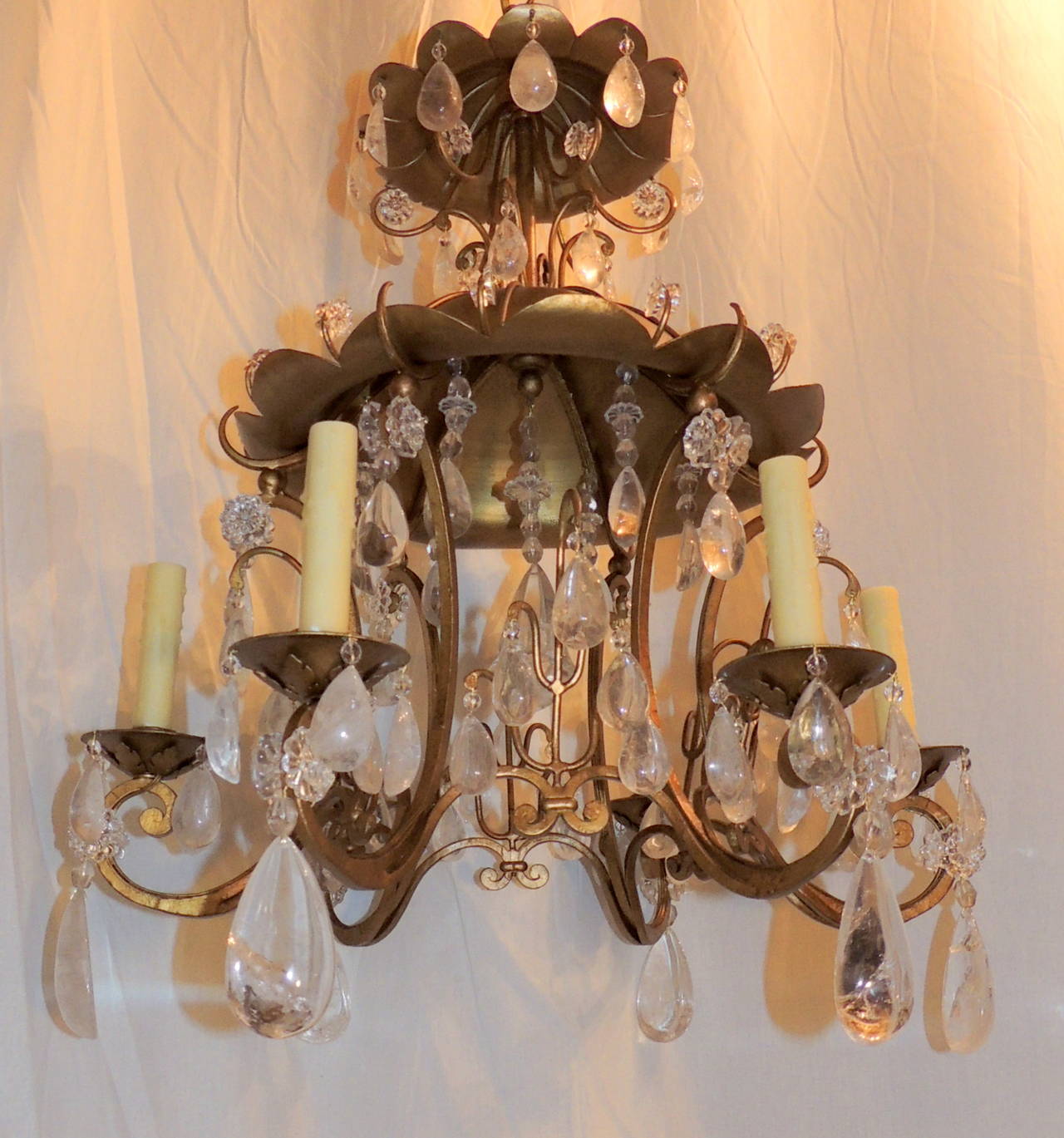 Wonderful Baguès gold gilt pagoda six-light chandelier dressed with rock crystal and crystal flowers. Finished in the centre with a fabulous rock crystal centrepiece.