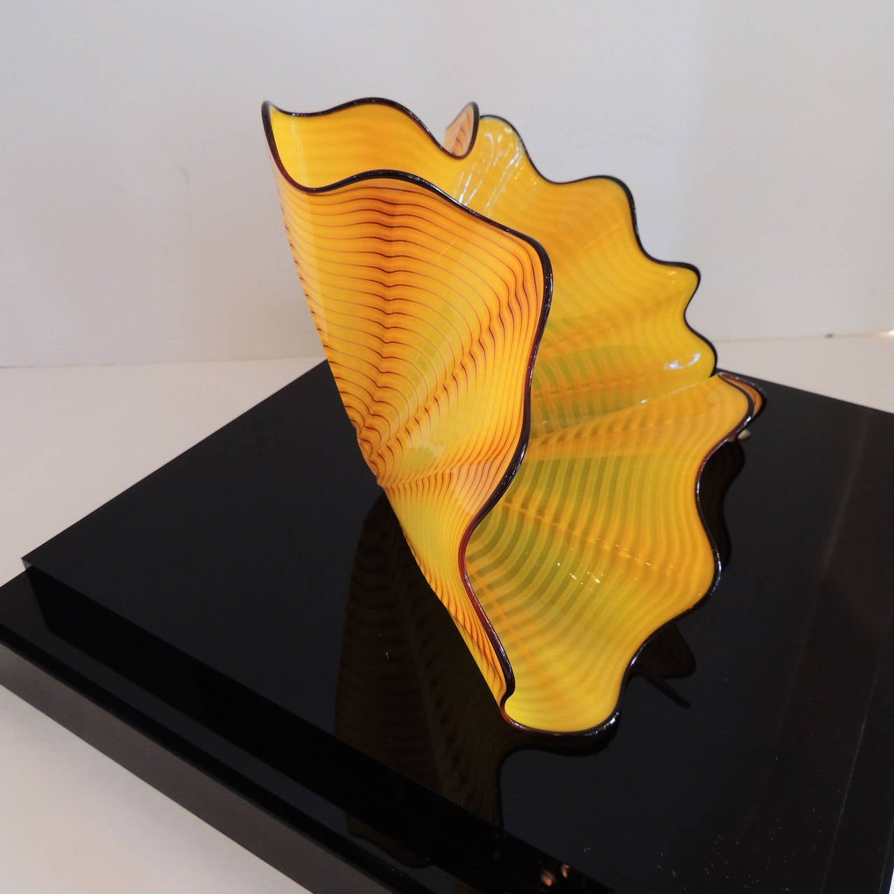 Rare Dale Chihuly’S Persian Pair in Bright Yellow Swirling Form with Black Trim In Excellent Condition In Roslyn, NY