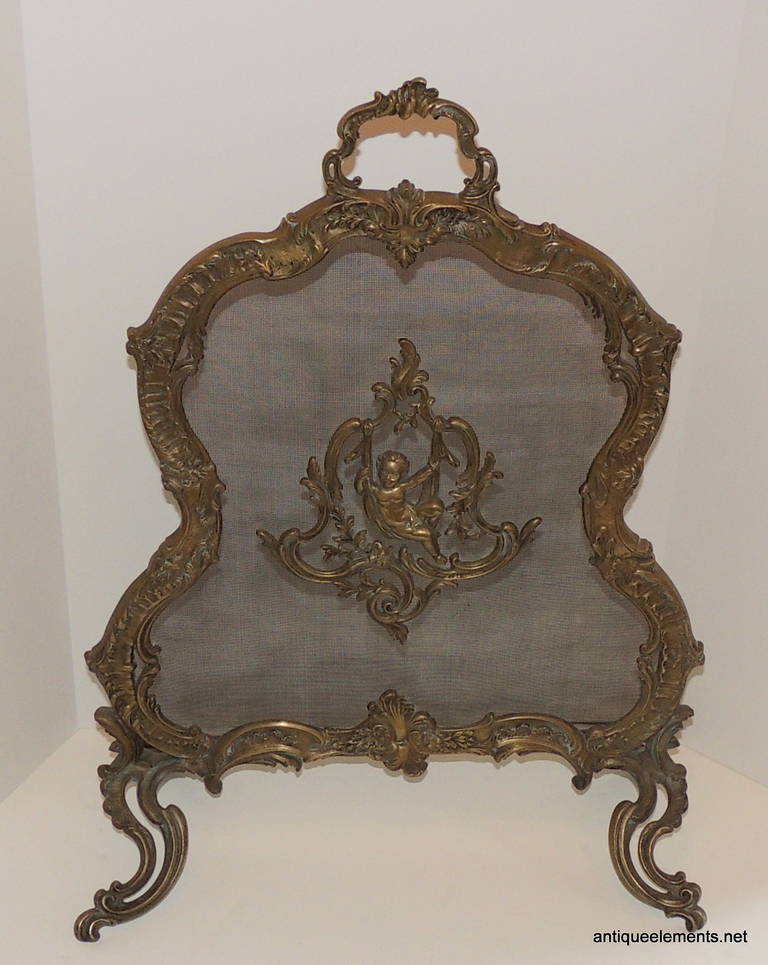 Sweet French Gilt Bronze Fireplace Screen Depicting a Swinging Cherub Firescreen In Good Condition In Roslyn, NY