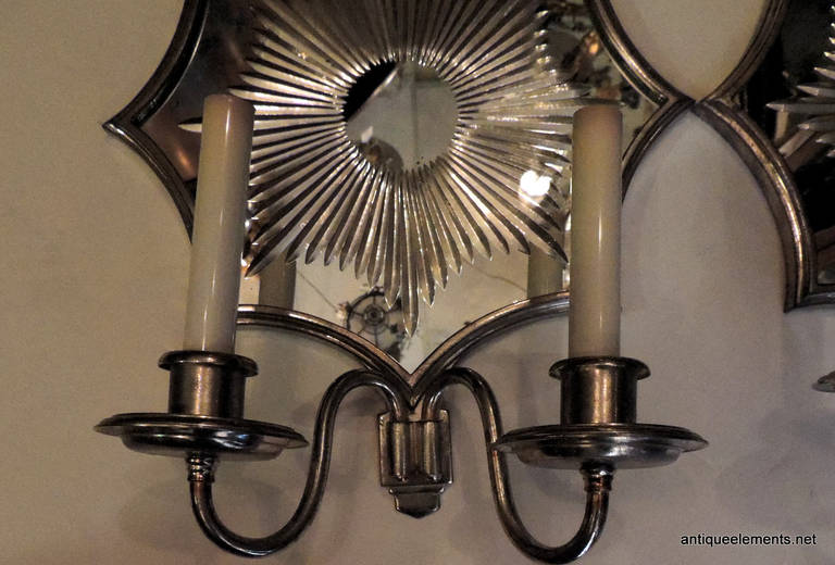 Wonderful Pair E.F. Caldwell Silver Art Deco Starburst Mirrored Wall Sconces In Good Condition In Roslyn, NY