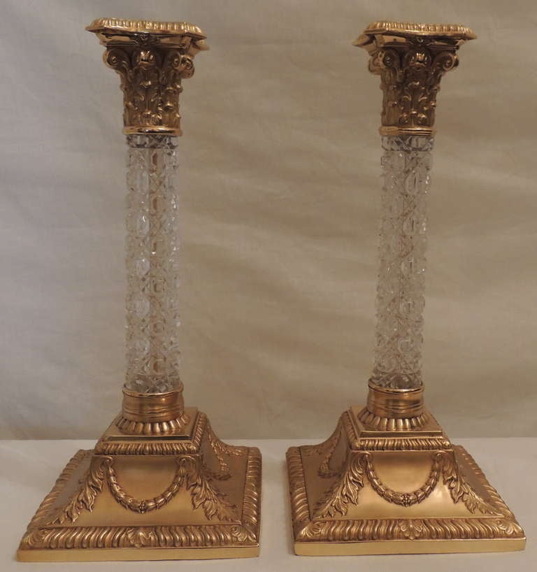 Pair of fine French doré bronze and cut crystal candlesticks, newly replated in doré bronze.