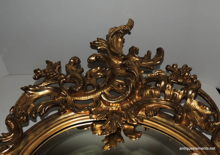 Extraordinary 19th Century French Carved & Gilt Cherub Rococo Mirror In Good Condition In Roslyn, NY