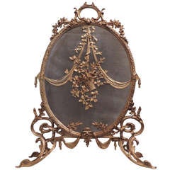 An Exquisite French Ormolu Mounted Oval Dore Bronze Fire Place Screen