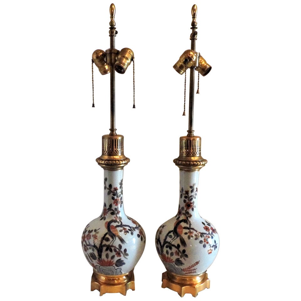 Wonderful Dore Bronze and Hand-Painted Porcelain Chinoiserie Bird Lamps
