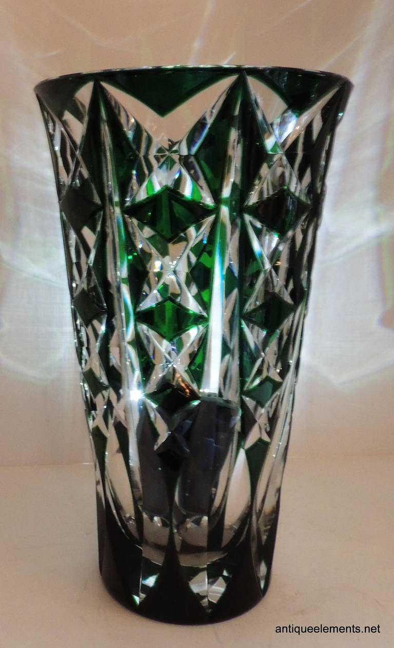 French Saint Louis Crystal Green Cut Crystal Vase is an exquisite translucent true green cut to clear vase by Saint Louis Crystal France.  This luxurious crystal vase sparkles brilliantly under a light and would look stunning in your curio or china