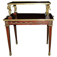 Exceptional Two Tier French Dore Bronze Ormolu Mounted Table Adorned W/ Cherub
