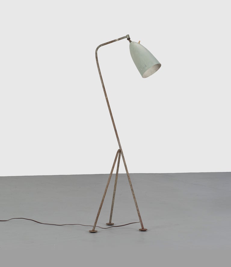 An iconic Grasshopper floor lamp by Greta Magnusson Grossman for Ralph O. Smith. Original celery green finish with heavy but handsome vintage patina.