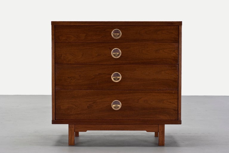 Edward Wormley for Dunbar four-drawer walnut dresser, model 5726, with inset ceramic tiles by Otto and Gertrud Natzler, from the Janus collection. The box joint construction creates a subtle striped pattern in the outer case. The finish appears to