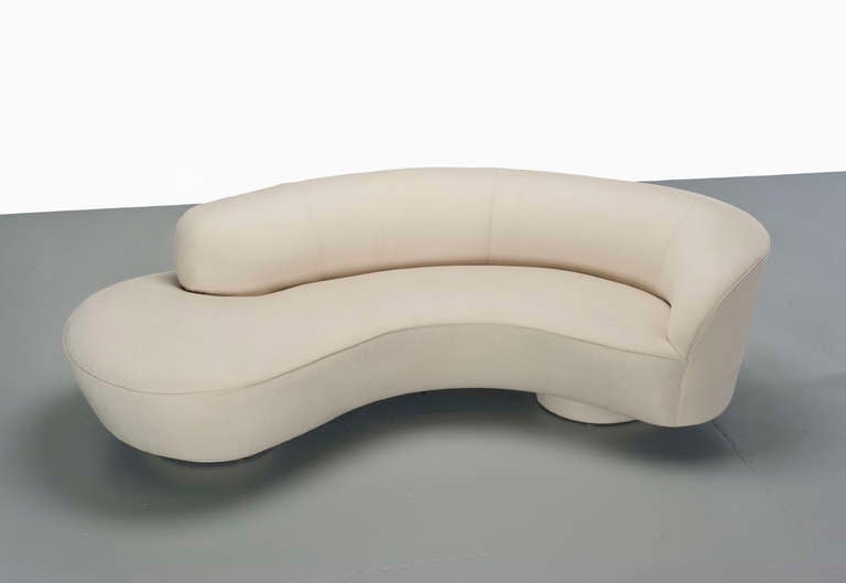 A curved sofa by Vladimir Kagan for Directional. Newly upholstered in gorgeous and soft Holland & Sherry wool. A fabric sample is available upon request. 

The depth of curve is 45 inches. The seat itself is 20 inches deep along the curve and