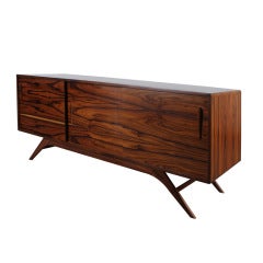 Newly produced rosewood mid century modern styled sideboard.