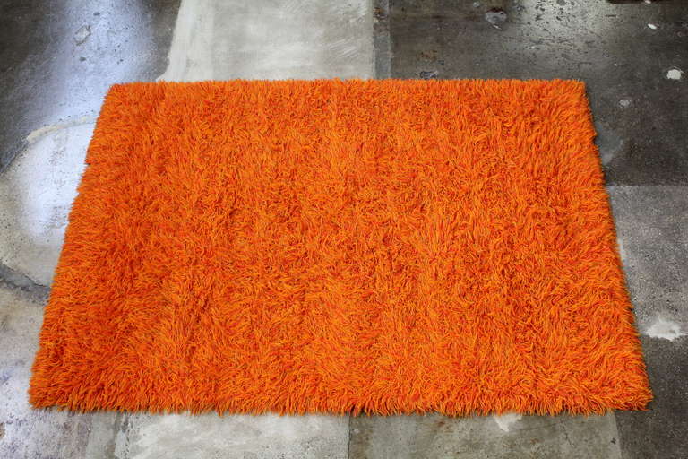 The perfect Mid-Century Modern Scandinavian orange rya rug.  Vintage shag rug in the perfect blend of oranges sure to enhance any mid century modern decor.