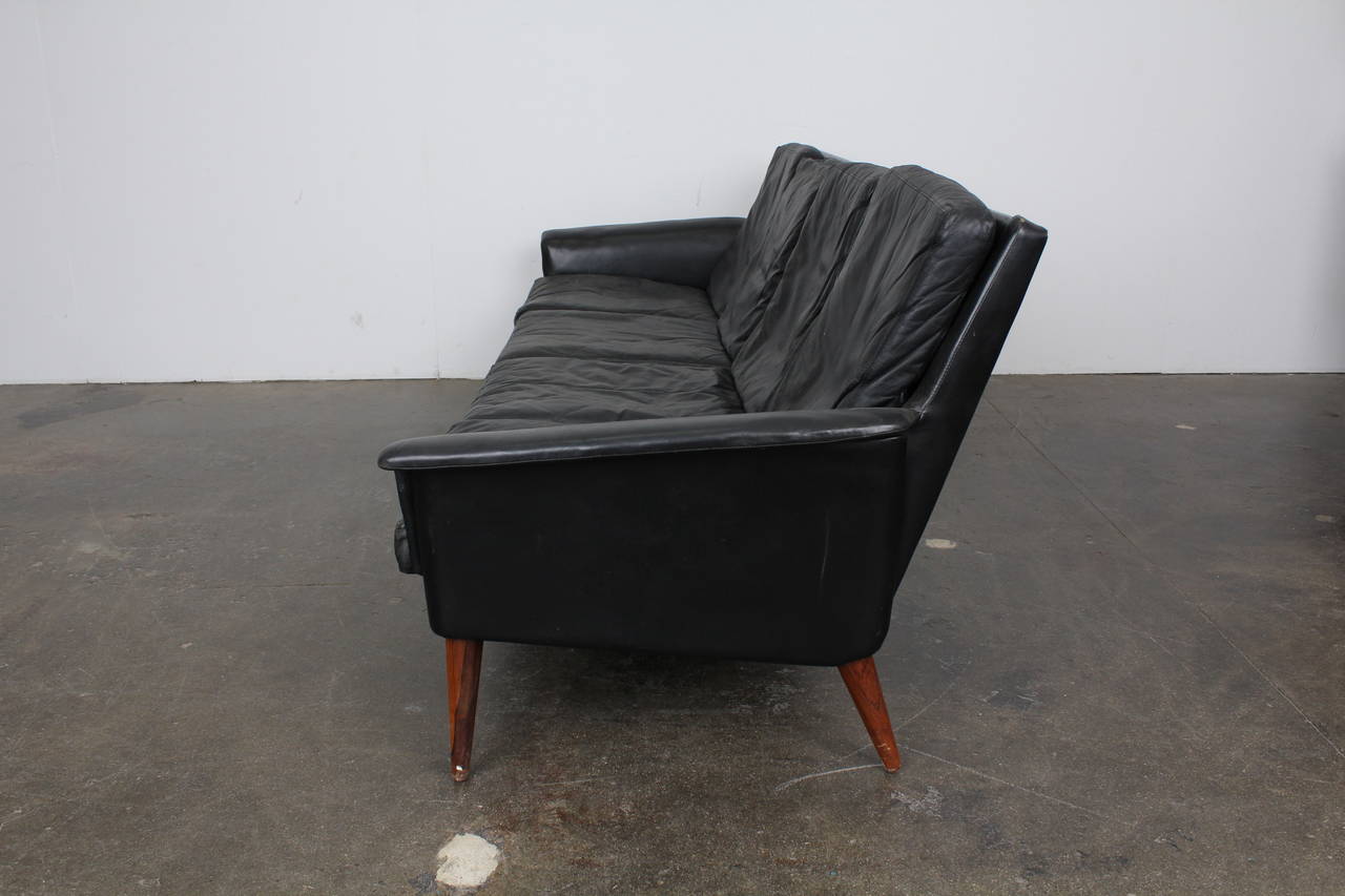 Mid Century Danish Four Seat Black Leather Sofa by H.W. Klein In Good Condition In North Hollywood, CA