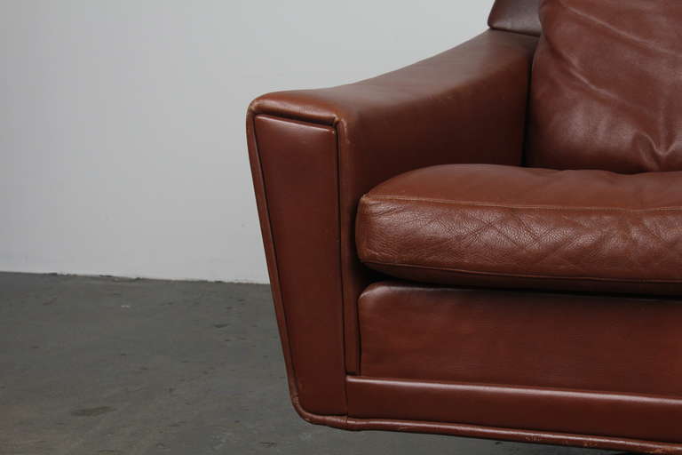 mid century modern leather swivel chair