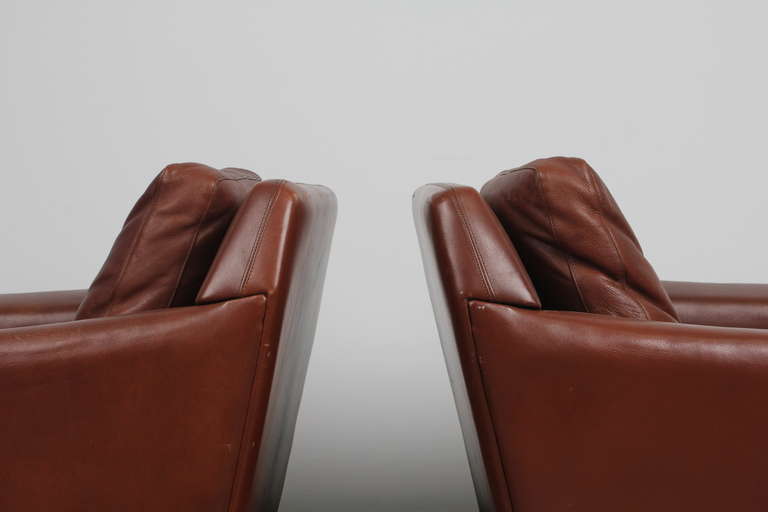 Mid-Century Modern Pair of Danish Mid Century Modern Leather Low Swivel Chairs