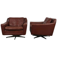 Pair of Danish Mid Century Modern Leather Low Swivel Chairs