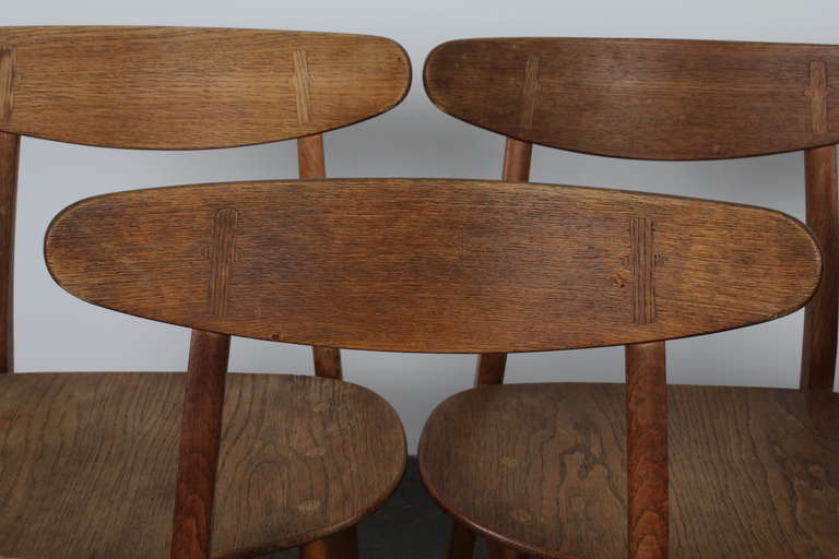 Hans Wegner CH-30 dining chairs beautifully aged in original vintage condition. A more rare version of this chair with all wood seats.  Oak chairs, not refinished/restored.