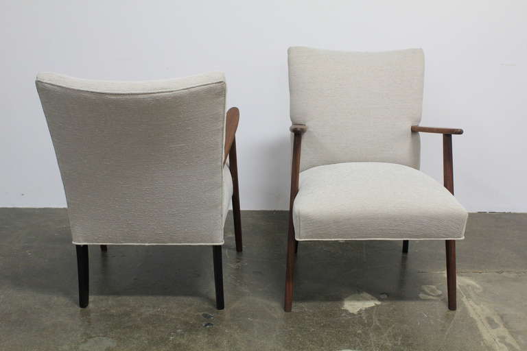 Mid-Century Modern Pair of Danish fabric arm chairs.