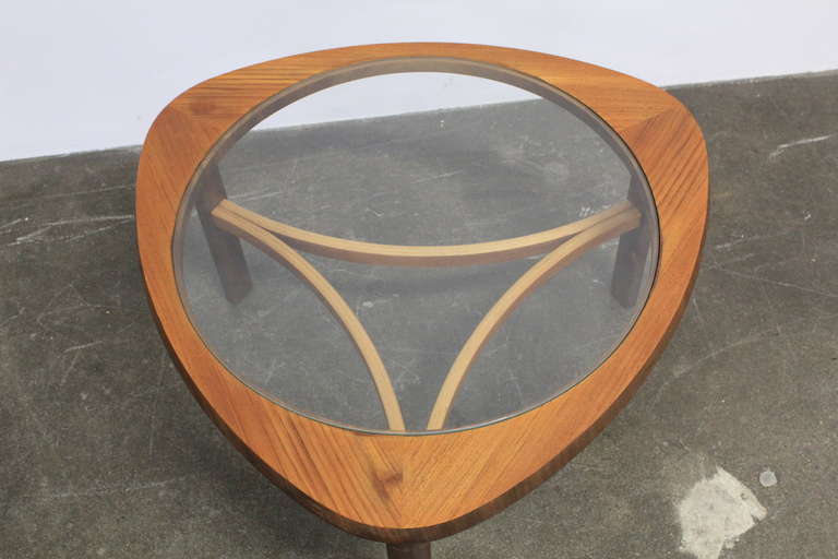 British English mid century modern rounded glass top and teak coffee table.