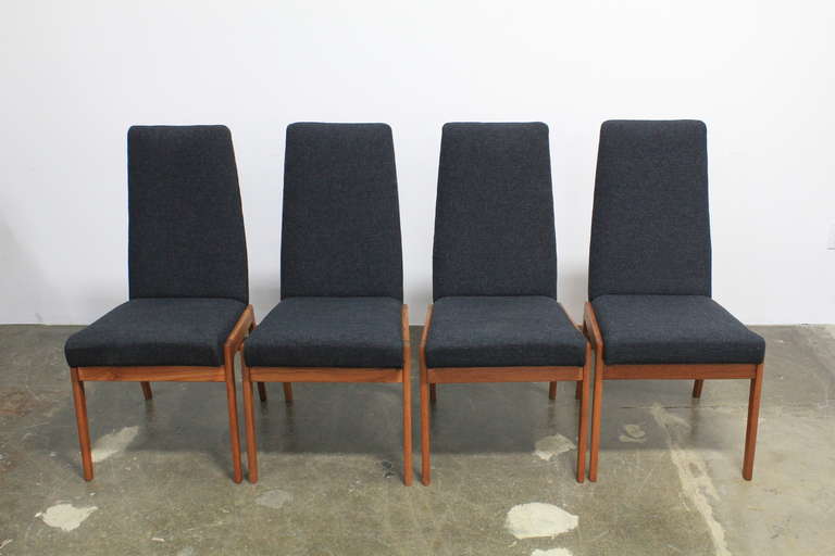 Mid-Century Modern Set of 4 tall back fabric and teak mid century modern dining chairs.
