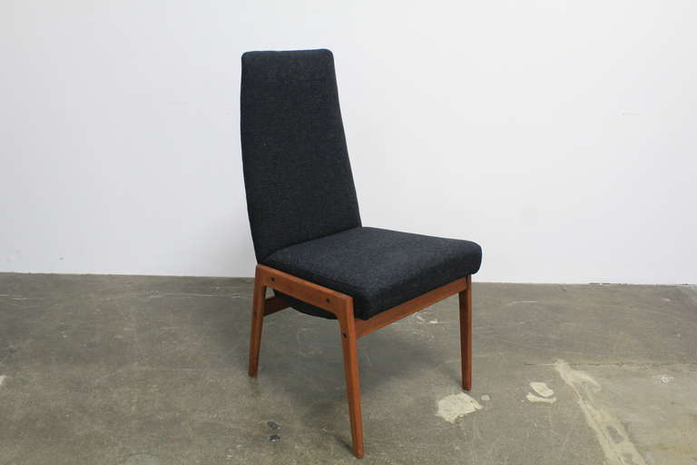 British Set of 4 tall back fabric and teak mid century modern dining chairs.