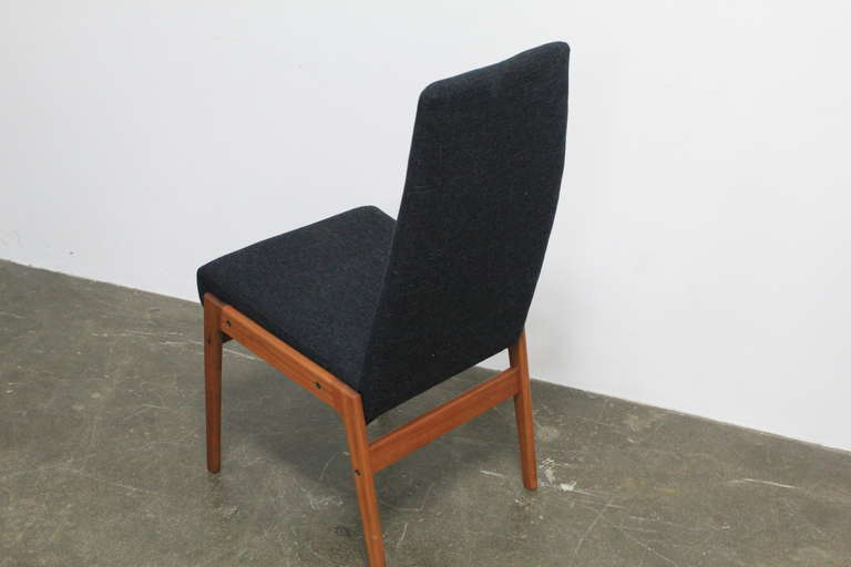 Mid-20th Century Set of 4 tall back fabric and teak mid century modern dining chairs.
