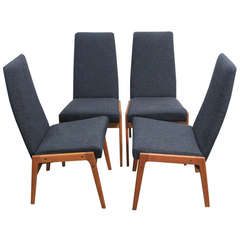 Set of 4 tall back fabric and teak mid century modern dining chairs.