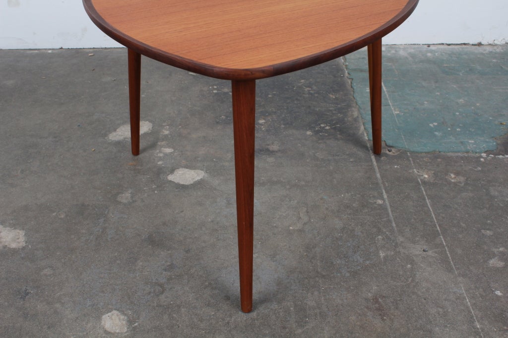 Mid-20th Century Danish mid century modern triangular teak coffee table.
